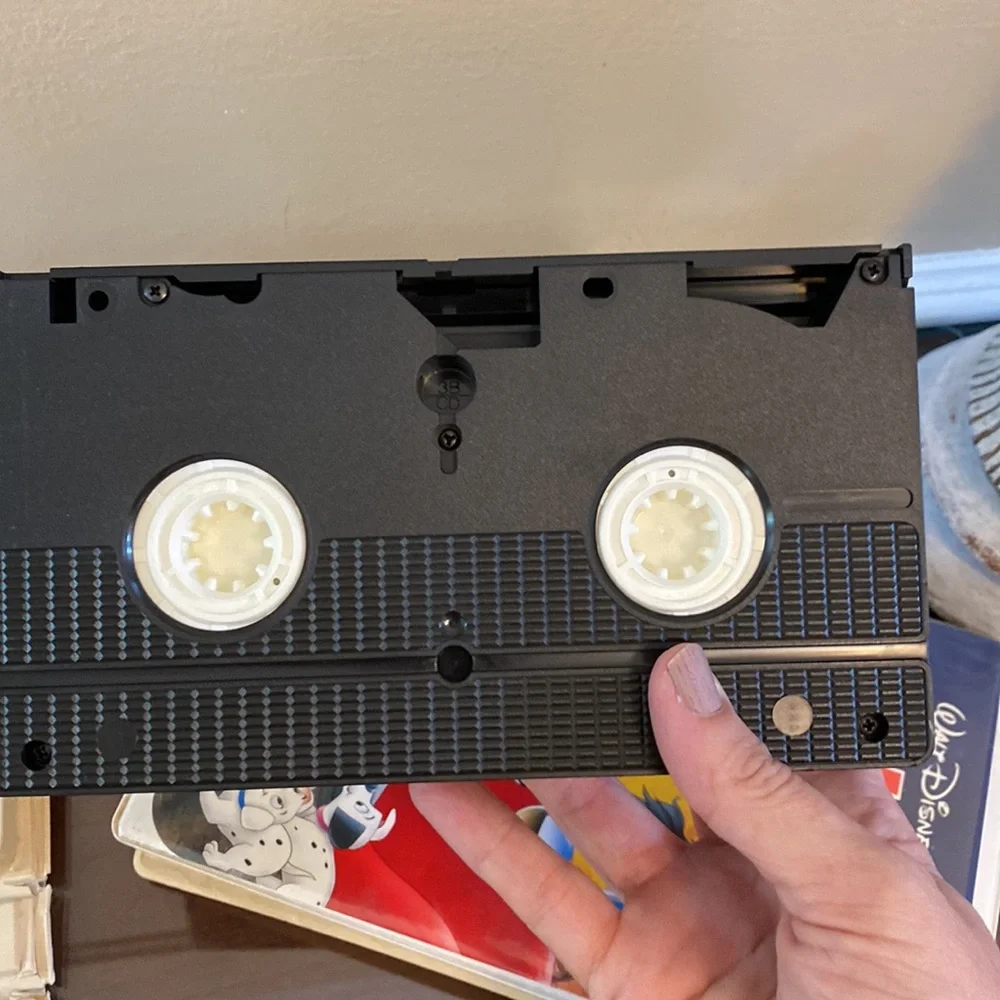 The Lion King VHS and 101 Dalmatians VHS